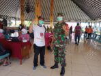 TNI Amankan Pemberian Suntikan Vaksin Covid-19 di Pendopo Surya Graha Kabupaten Magetan.