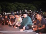 Polres Kediri Gelar Doa Bersama dan Aksi Peletakan Karangan Bunga Serta Nyalakan 1000 Lilin Turut Duka Tragedi Kanjuruhan