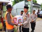 Jelang Idhul Fitri, Kapolres Atensi Perlintasan Sebidang KA Tanpa Palang Pintu Berkenan Memberikan Bansos Ke Penjaga