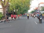 Amankan Fun Run 10K, Polsek Denpasar Barat Jaga Rute Yang Dilalui Peserta